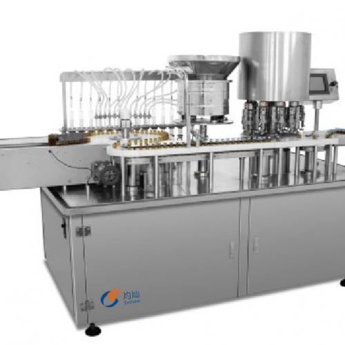 High speed liquid filling and capping machine